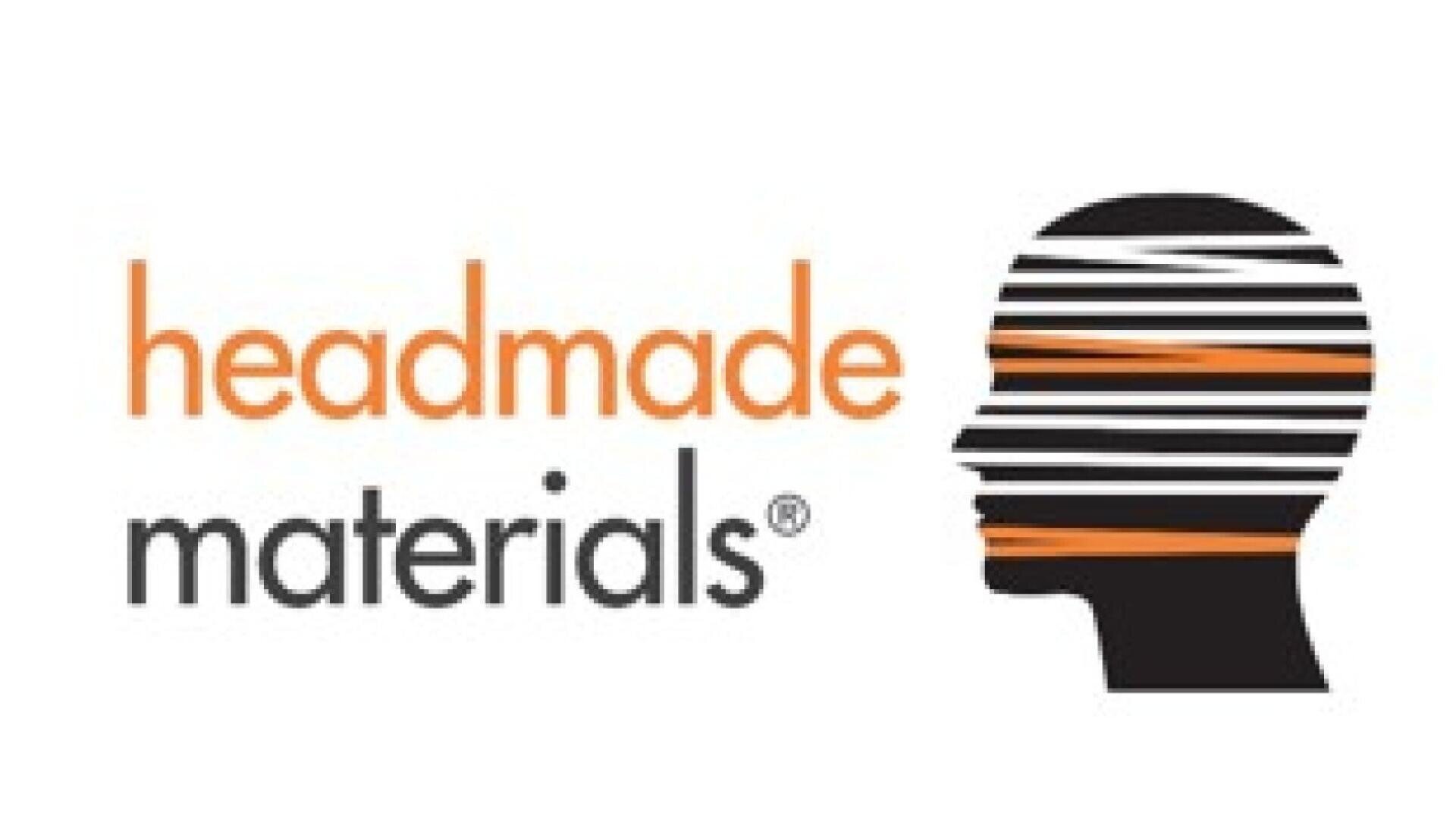 Logo for headmade materials featuring the company name in orange and gray text next to a black silhouette of a head with orange and white horizontal lines across it.