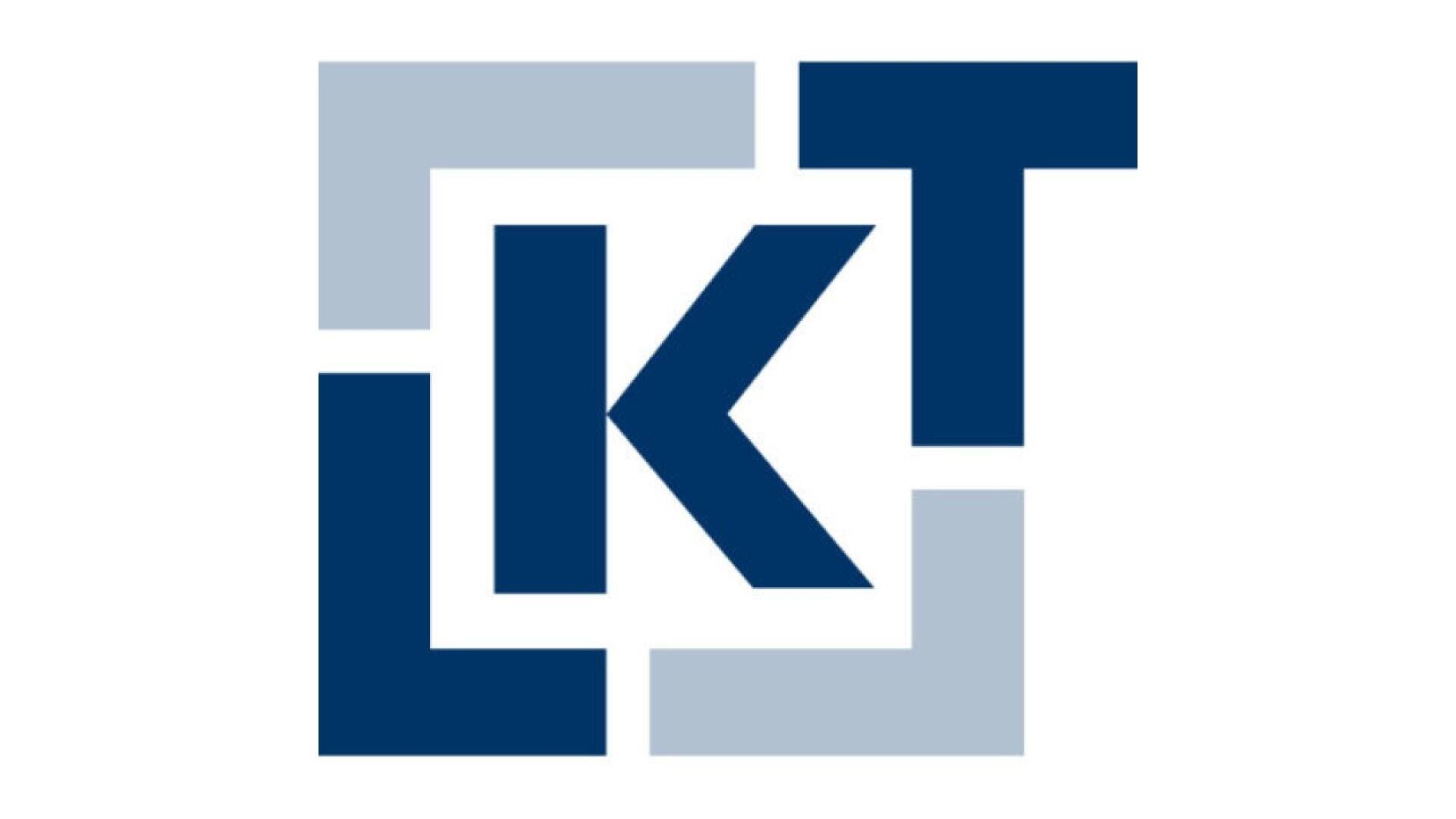A stylized logo featuring the letters “LKT” in dark blue, with light blue square brackets forming a partial border around the letters. The logo is on a white background.