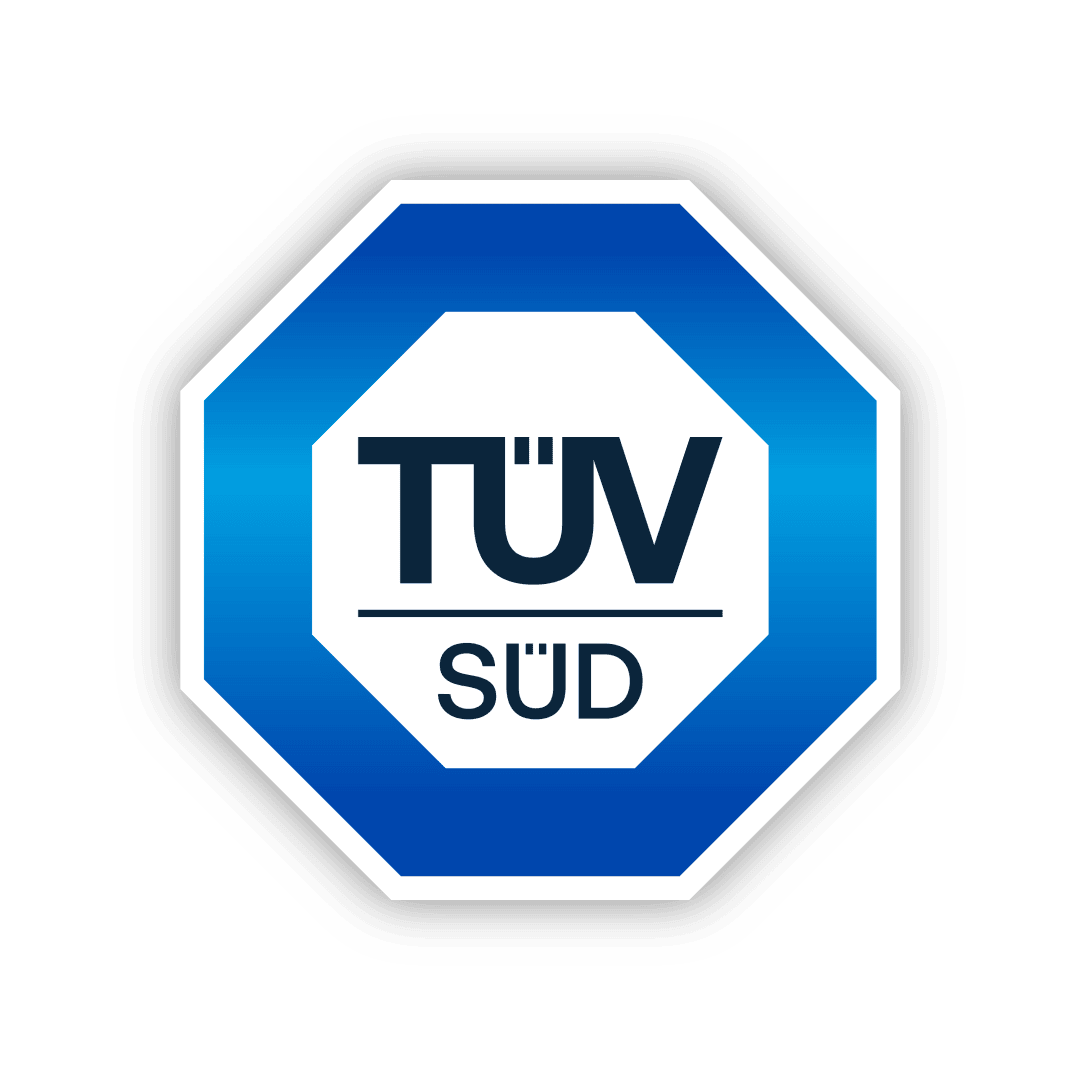Ein blaues und weißes achteckiges Logo mit dem Text TÜV SÜD in fetten Buchstaben in der Mitte. Der äußere Rand ist schwarz, die Mitte ist weiß mit einem dicken blauen Rand.