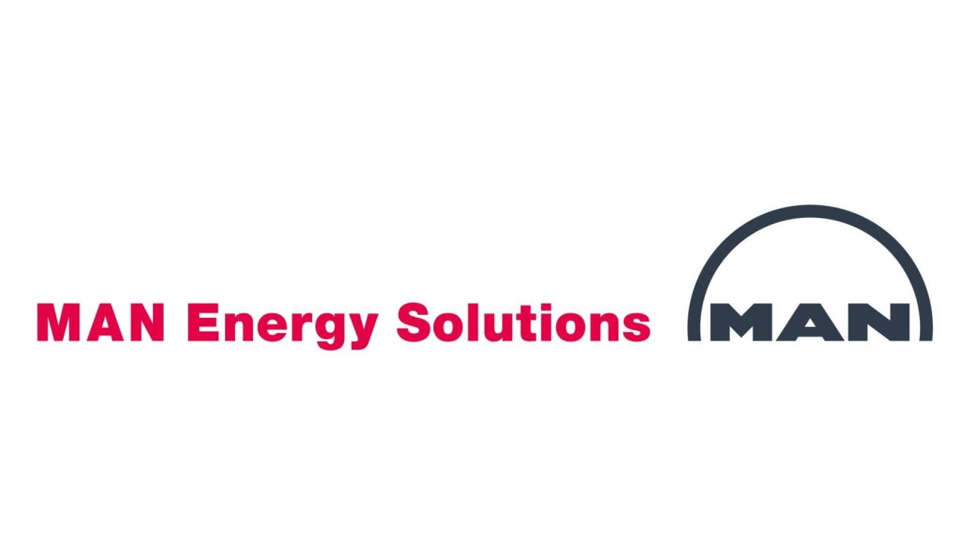 Logo of MAN Energy Solutions with the company name in bold pink and gray text on a white background. The logo includes a stylized gray arc above the word MAN on the right side.