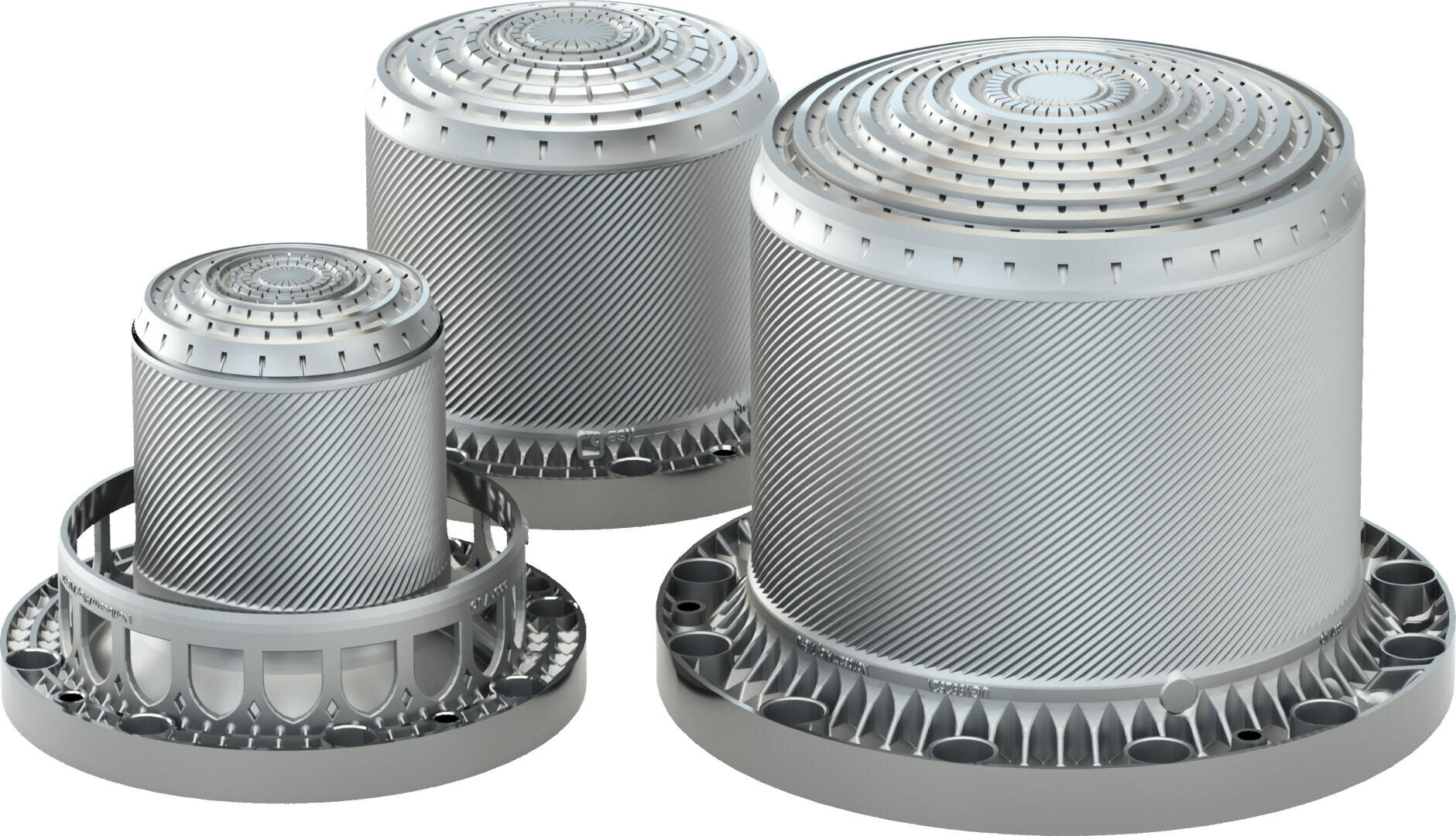 Three cylindrical metal components with perforated tops and textured sides, standing on round bases with multiple holes, displayed against a white background.